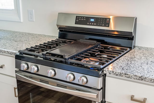 1106 Roseland Dr, Columbia, TN 38401 - interior details featuring light stone counters and stainless steel gas stove