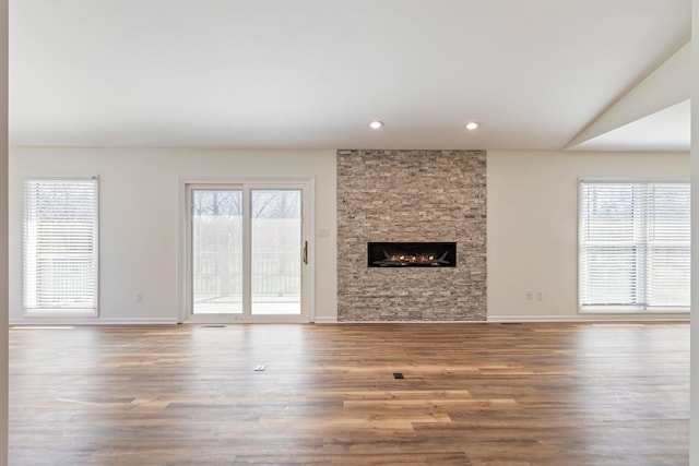 1106 Roseland Dr, Columbia, TN 38401 - unfurnished living room with recessed lighting, baseboards, a fireplace, and wood finished floors