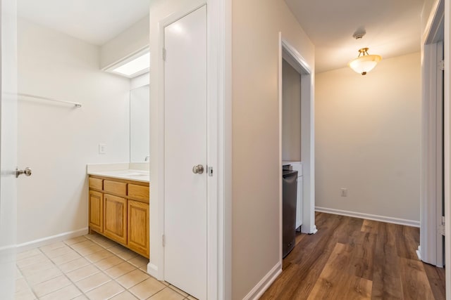 1106 Roseland Dr, Columbia, TN 38401 - hallway with baseboards and a sink