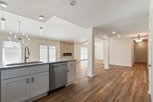 1106 Roseland Dr, Columbia, TN 38401 - kitchen with open floor plan, light stone countertops, a sink, and dishwasher