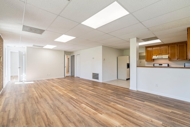 1106 Roseland Dr, Columbia, TN 38401 - unfurnished living room with a drop ceiling, light wood-style flooring, baseboards, and visible vents