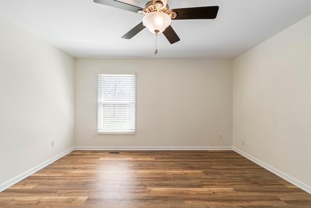 1106 Roseland Dr, Columbia, TN 38401 - unfurnished room featuring a ceiling fan, baseboards, and wood finished floors