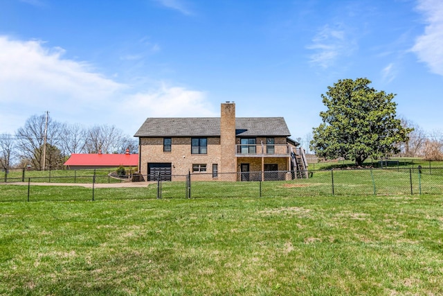 1106 Roseland Dr, Columbia, TN 38401 - back of property featuring a fenced backyard, stairs, an attached garage, and a lawn