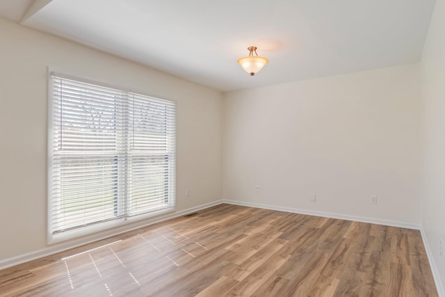 1106 Roseland Dr, Columbia, TN 38401 - unfurnished room with light wood finished floors, baseboards, and visible vents