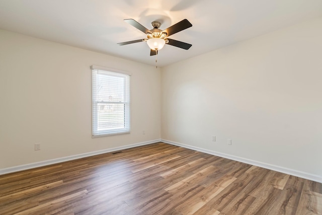1106 Roseland Dr, Columbia, TN 38401 - unfurnished room with baseboards, wood finished floors, and ceiling fan