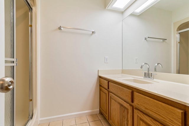 1106 Roseland Dr, Columbia, TN 38401 - full bathroom featuring an enclosed shower, baseboards, tile patterned flooring, and vanity