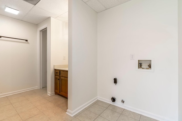 1106 Roseland Dr, Columbia, TN 38401 - laundry room featuring gas dryer hookup, hookup for a washing machine, baseboards, laundry area, and light tile patterned floors