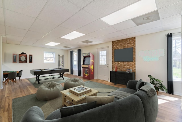 1106 Roseland Dr, Columbia, TN 38401 - living area with a paneled ceiling, plenty of natural light, and wood finished floors