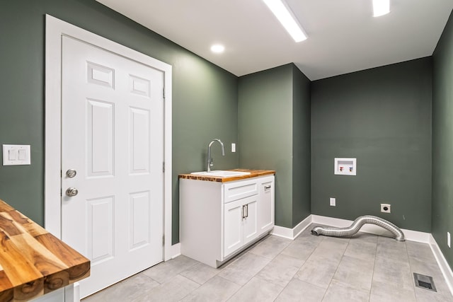 1106 Roseland Dr, Columbia, TN 38401 - laundry room featuring a sink, hookup for an electric dryer, laundry area, visible vents, and hookup for a washing machine