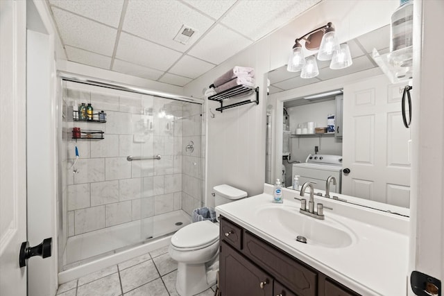 full bath featuring vanity, toilet, washer / clothes dryer, a stall shower, and visible vents