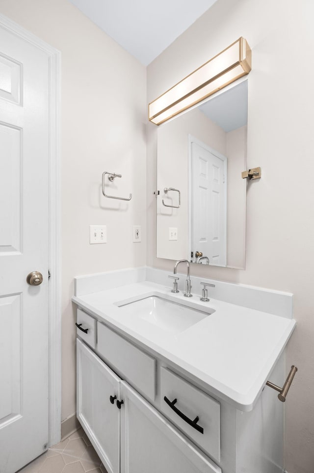 bathroom featuring tile patterned floors and vanity