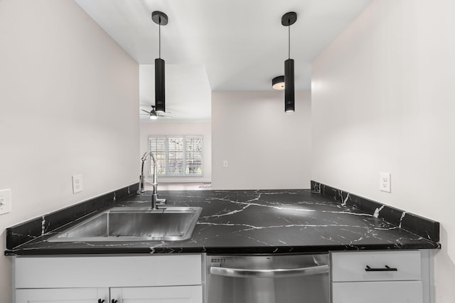 kitchen with dishwasher, white cabinets, a ceiling fan, and a sink
