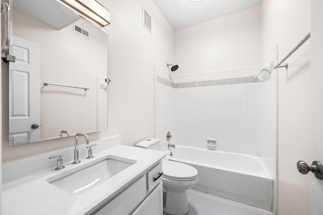 bathroom with vanity, toilet, visible vents, and shower / bath combination