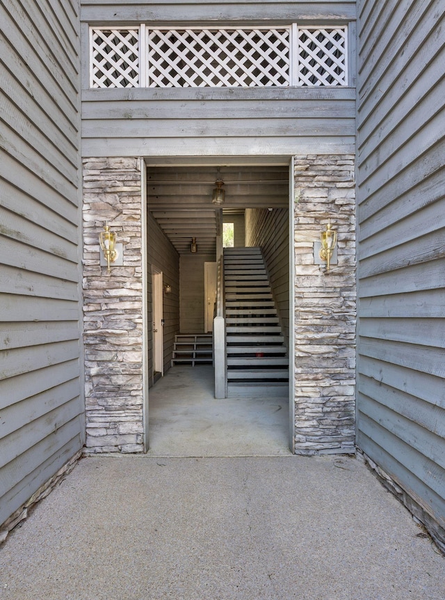view of exterior entry with stone siding