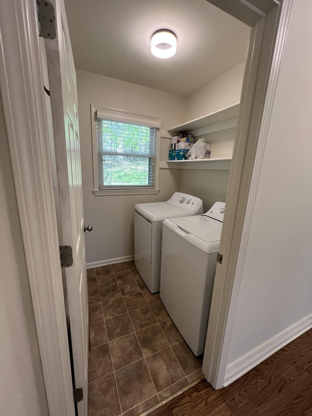 laundry room with washer and dryer, laundry area, and baseboards