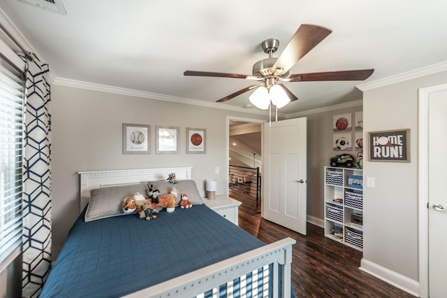 bedroom with dark wood-type flooring, baseboards, visible vents, and crown molding