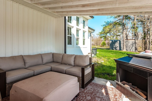 view of patio featuring an outdoor structure and an outdoor hangout area