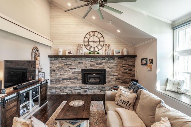 living area featuring a fireplace, wood finished floors, ceiling fan, and wood walls