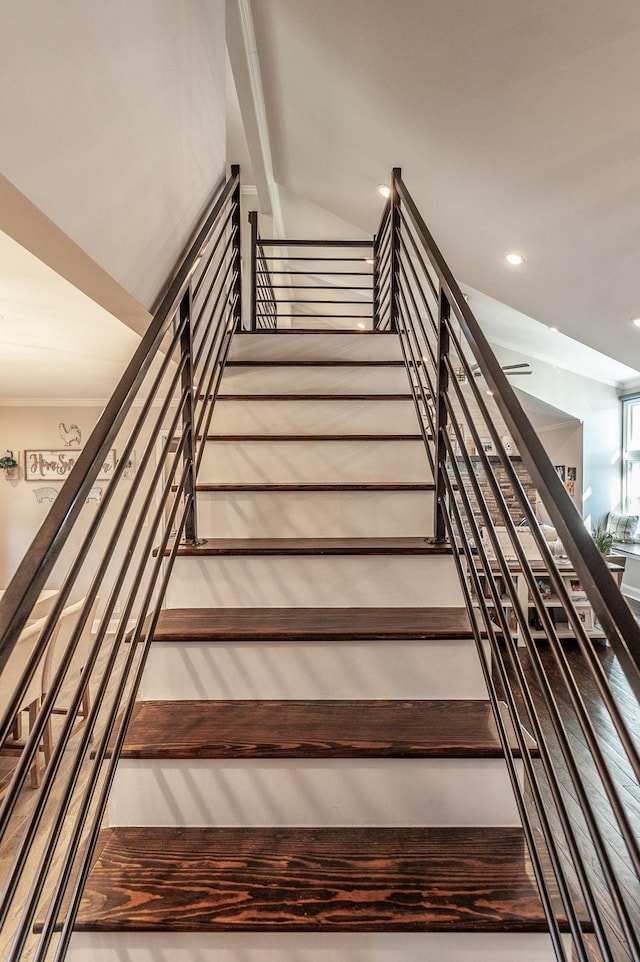 staircase with recessed lighting