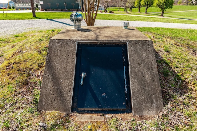 entry to storm shelter with a yard