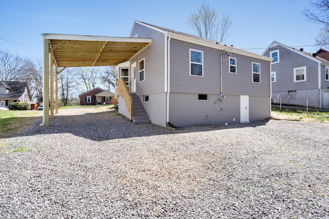 832 Richardson St, Clarksville, TN 37040 - rear view of property with driveway and a carport