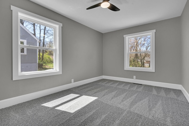 832 Richardson St, Clarksville, TN 37040 - carpeted empty room with healthy amount of natural light, baseboards, and ceiling fan