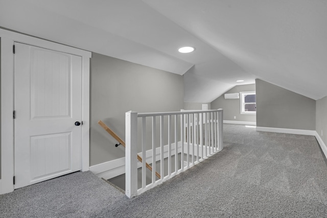 832 Richardson St, Clarksville, TN 37040 - additional living space with carpet floors, lofted ceiling, baseboards, an AC wall unit, and recessed lighting