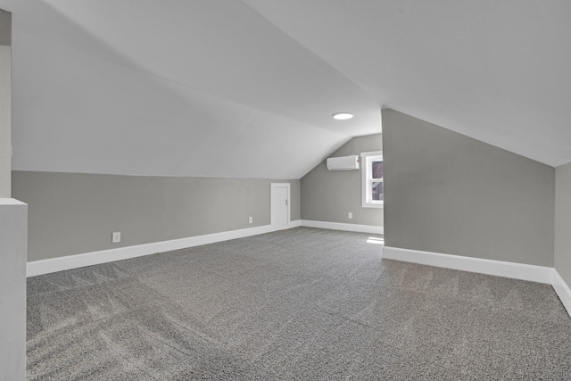 832 Richardson St, Clarksville, TN 37040 - bonus room featuring an AC wall unit, baseboards, vaulted ceiling, and carpet floors
