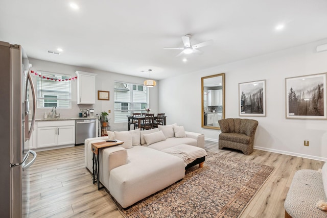 923 Long Train Aly, Antioch, TN 37013 - living room with visible vents, baseboards, recessed lighting, a ceiling fan, and light wood-style floors
