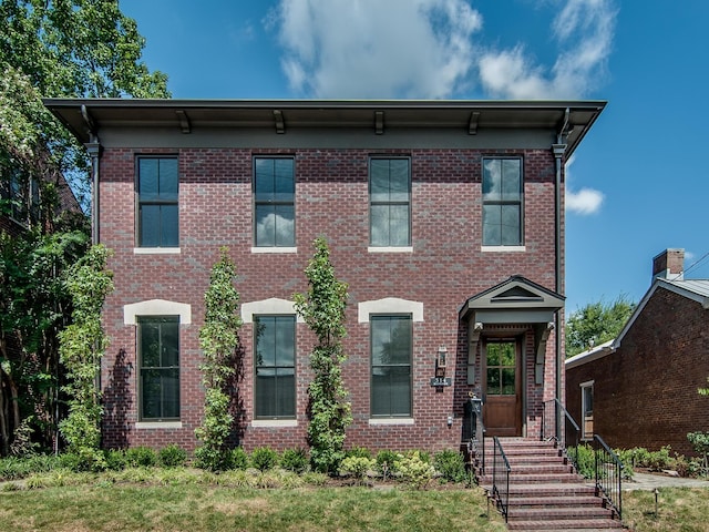 view of front facade with brick siding
