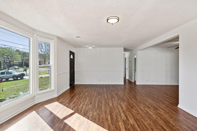 3049 Fieldstone Dr, Antioch, TN 37013 - unfurnished room featuring a textured ceiling, baseboards, and wood finished floors