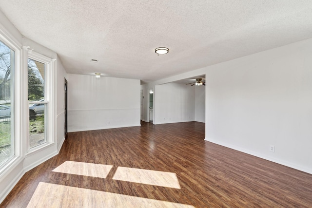 3049 Fieldstone Dr, Antioch, TN 37013 - empty room featuring a textured ceiling, wood finished floors, baseboards, and a ceiling fan