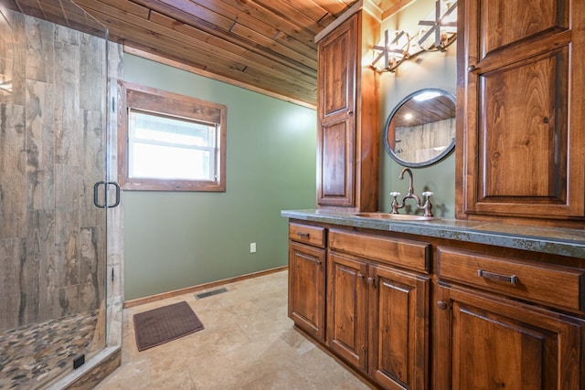 576 Ridgeway Dr, Sugar Tree, TN 38380 - full bathroom featuring vanity, wooden ceiling, baseboards, a stall shower, and visible vents