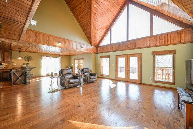 576 Ridgeway Dr, Sugar Tree, TN 38380 - living area featuring vaulted ceiling, french doors, wooden ceiling, baseboards, and hardwood / wood-style flooring