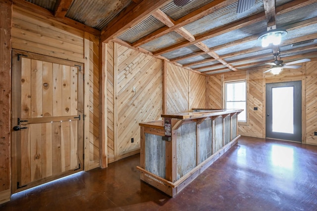 576 Ridgeway Dr, Sugar Tree, TN 38380 - additional living space featuring a ceiling fan, finished concrete flooring, and wooden walls