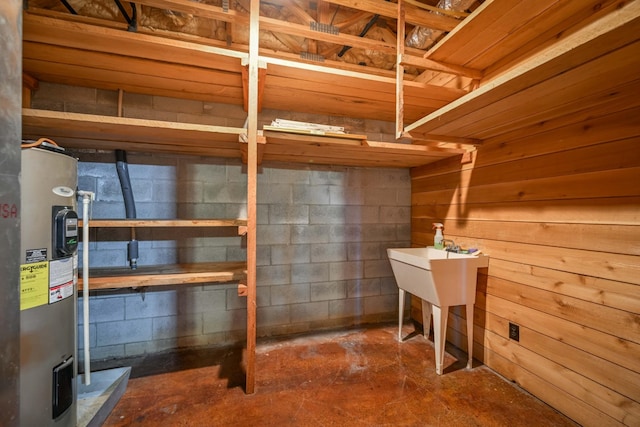 576 Ridgeway Dr, Sugar Tree, TN 38380 - unfinished below grade area with concrete block wall and electric water heater