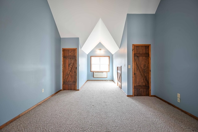 576 Ridgeway Dr, Sugar Tree, TN 38380 - interior space with baseboards, high vaulted ceiling, a wall mounted AC, and carpet