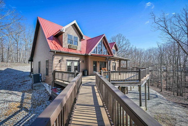 576 Ridgeway Dr, Sugar Tree, TN 38380 - rear view of house featuring central AC, metal roof, and a wooden deck