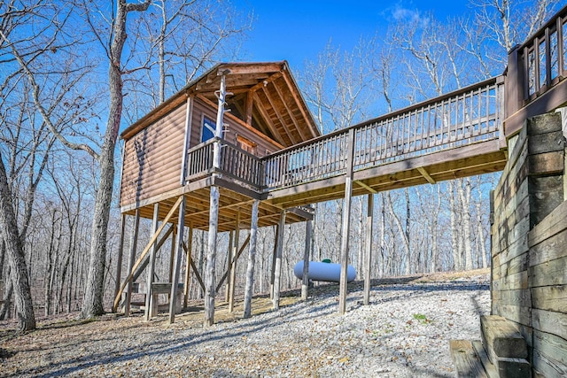 576 Ridgeway Dr, Sugar Tree, TN 38380 - view of property exterior featuring log veneer siding and a deck
