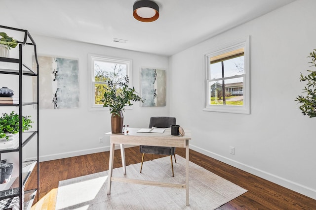 234 Spring St, La Vergne, TN 37086 - office featuring baseboards, wood finished floors, a wealth of natural light, and visible vents