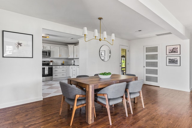 234 Spring St, La Vergne, TN 37086 - dining area with baseboards, visible vents, and wood finished floors