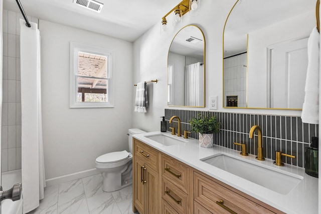 234 Spring St, La Vergne, TN 37086 - bathroom with toilet, visible vents, a sink, and marble finish floor