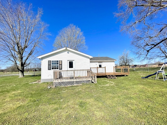 1088 Poole Mill Rd, Crofton, KY 42217 - rear view of house featuring a lawn, a deck, and a playground