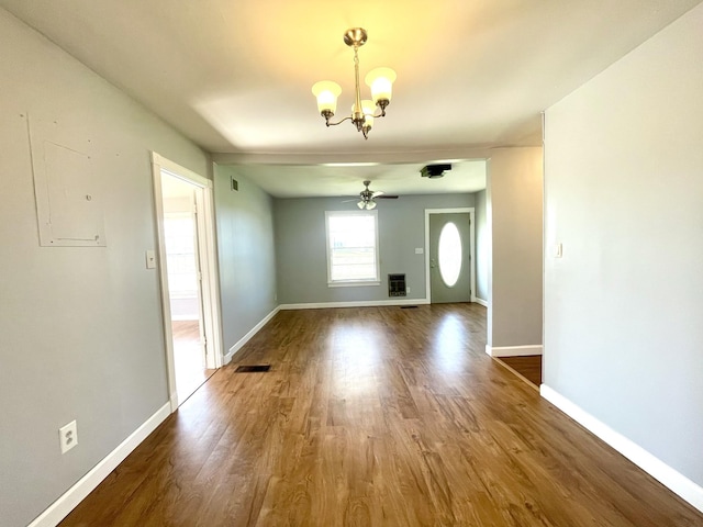 1088 Poole Mill Rd, Crofton, KY 42217 - interior space with baseboards, dark wood-style floors, visible vents, and ceiling fan with notable chandelier