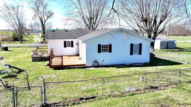 1088 Poole Mill Rd, Crofton, KY 42217 - back of property with a fenced backyard, a wooden deck, and a yard