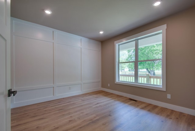 1151 Canaan Rd, Columbia, TN 38401 - unfurnished room with light wood finished floors, baseboards, and recessed lighting