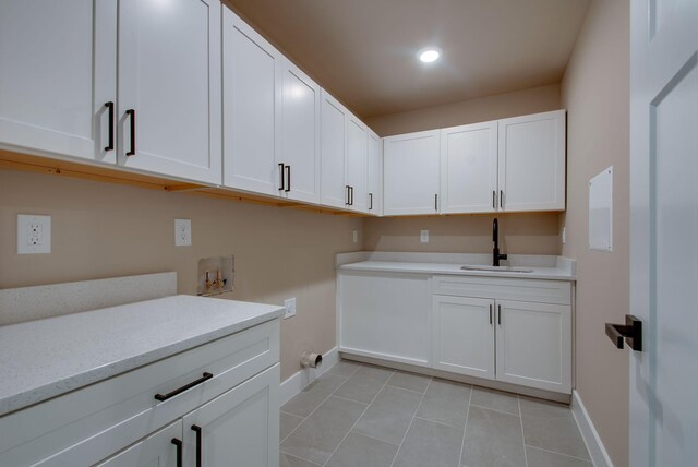 1151 Canaan Rd, Columbia, TN 38401 - laundry room with baseboards, hookup for a washing machine, cabinet space, light tile patterned flooring, and recessed lighting