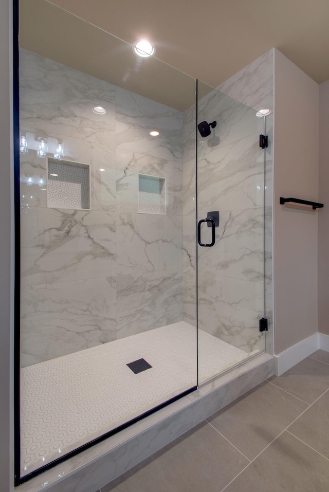 1151 Canaan Rd, Columbia, TN 38401 - full bath with a marble finish shower, recessed lighting, baseboards, and tile patterned flooring
