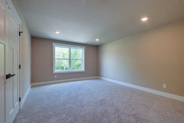 1151 Canaan Rd, Columbia, TN 38401 - carpeted empty room featuring baseboards and recessed lighting