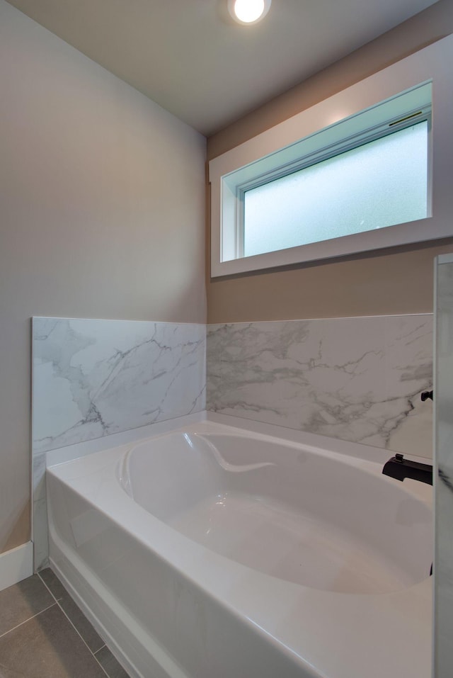 1151 Canaan Rd, Columbia, TN 38401 - bathroom featuring a bath and tile patterned floors
